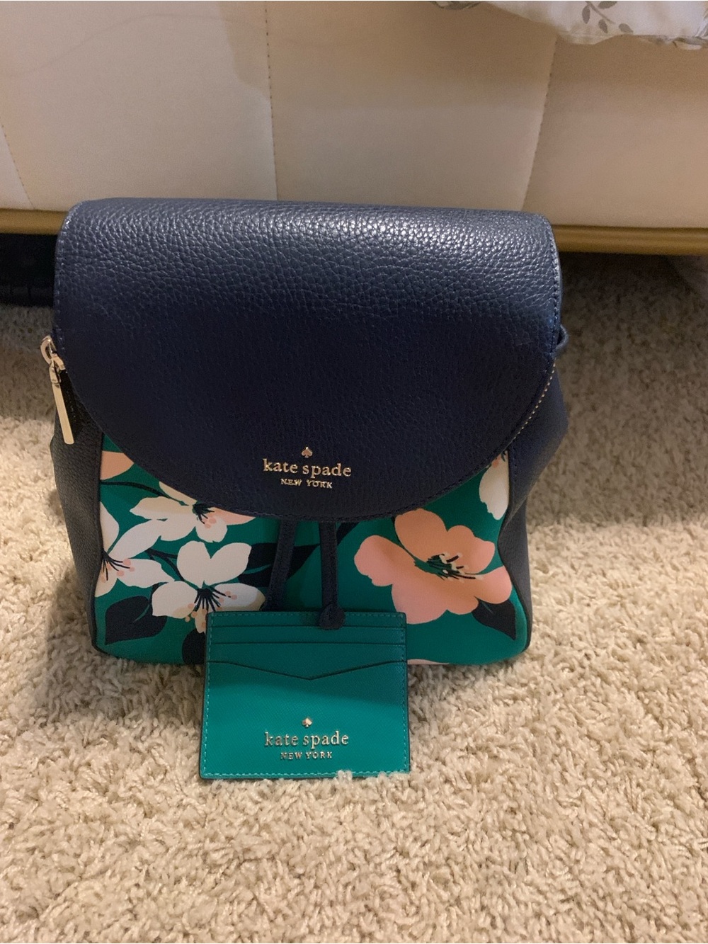 Kate Spade floral leather backpack in navy, teal & peach